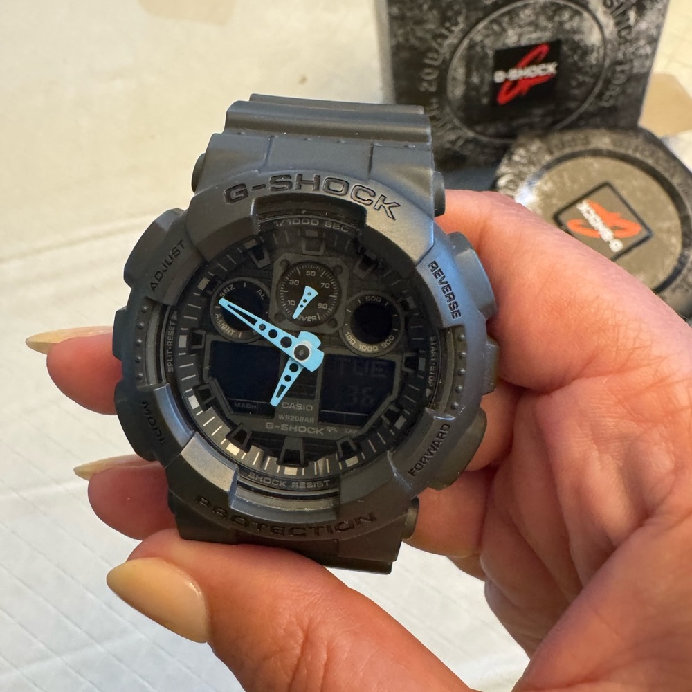 Casio G-Shock Black Watch with Light Blue Hands